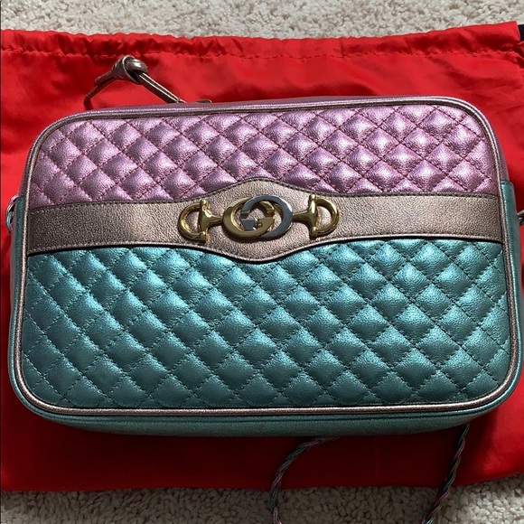 Gucci Handbags - Authentic Gucci Metallic Bag NWOT.